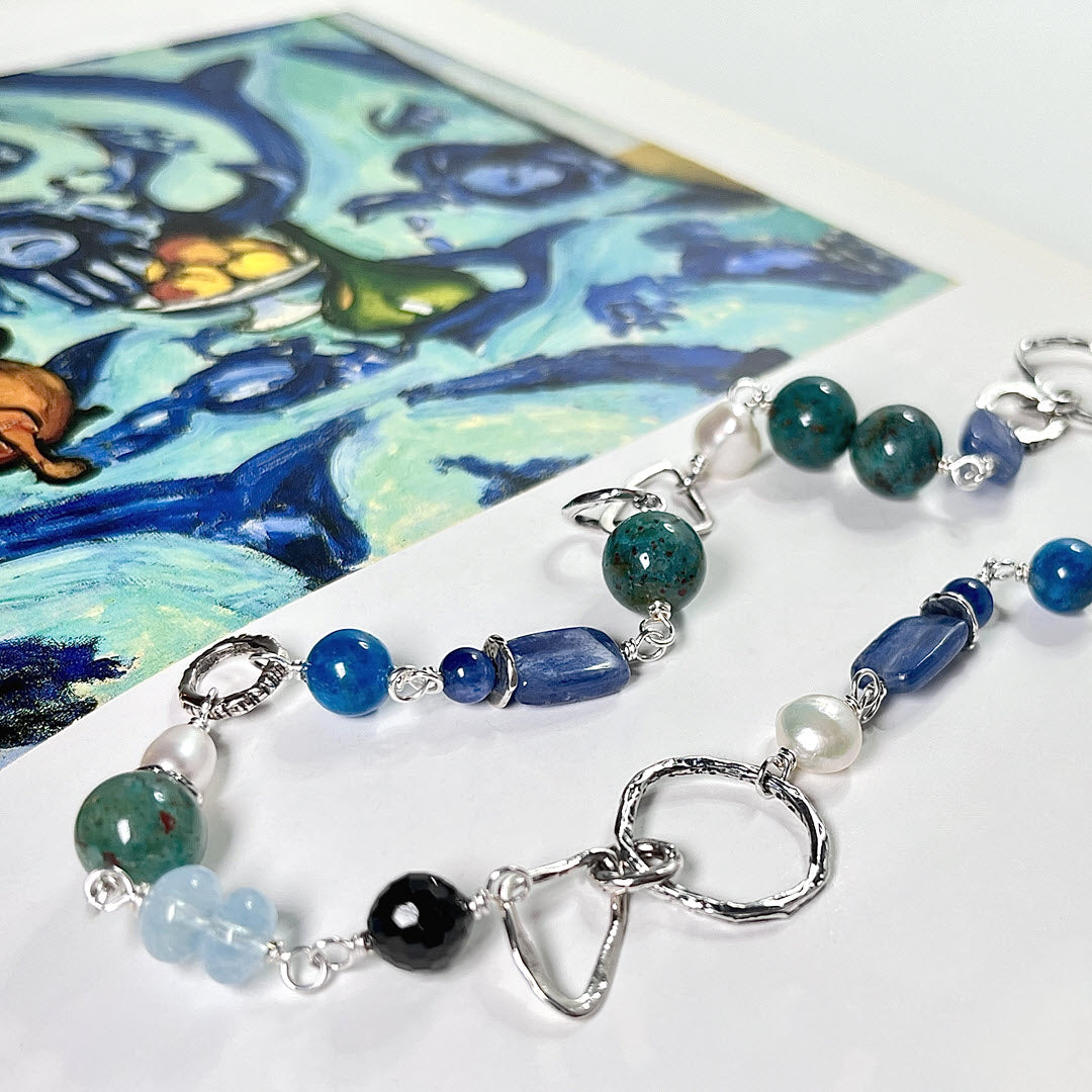 Teal and turquoise colored gemstone and sterling gemstone necklace