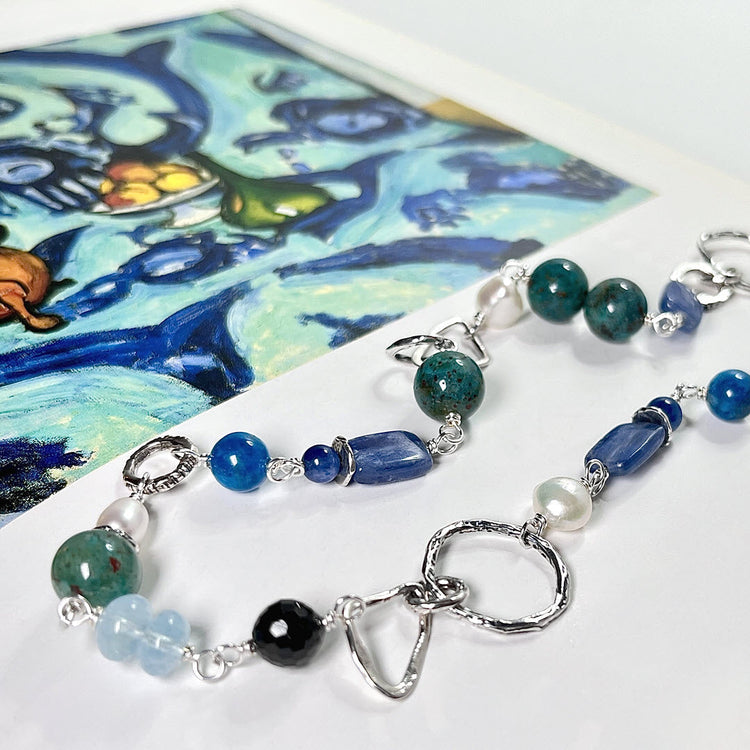 Teal and turquoise colored gemstone and sterling gemstone necklace