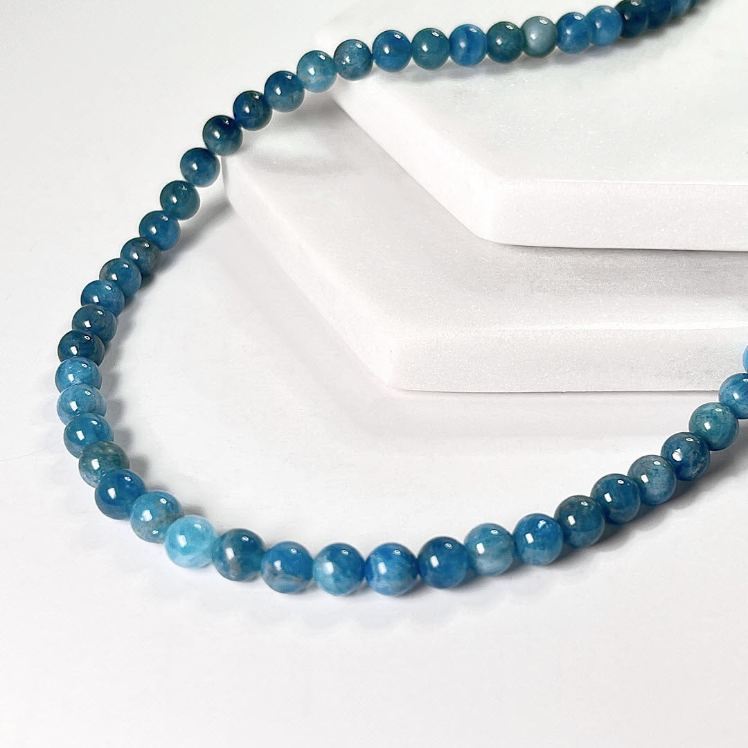 Deep teal-turquoise colored neon apatite beaded necklace with sterling silver clasp and extender
