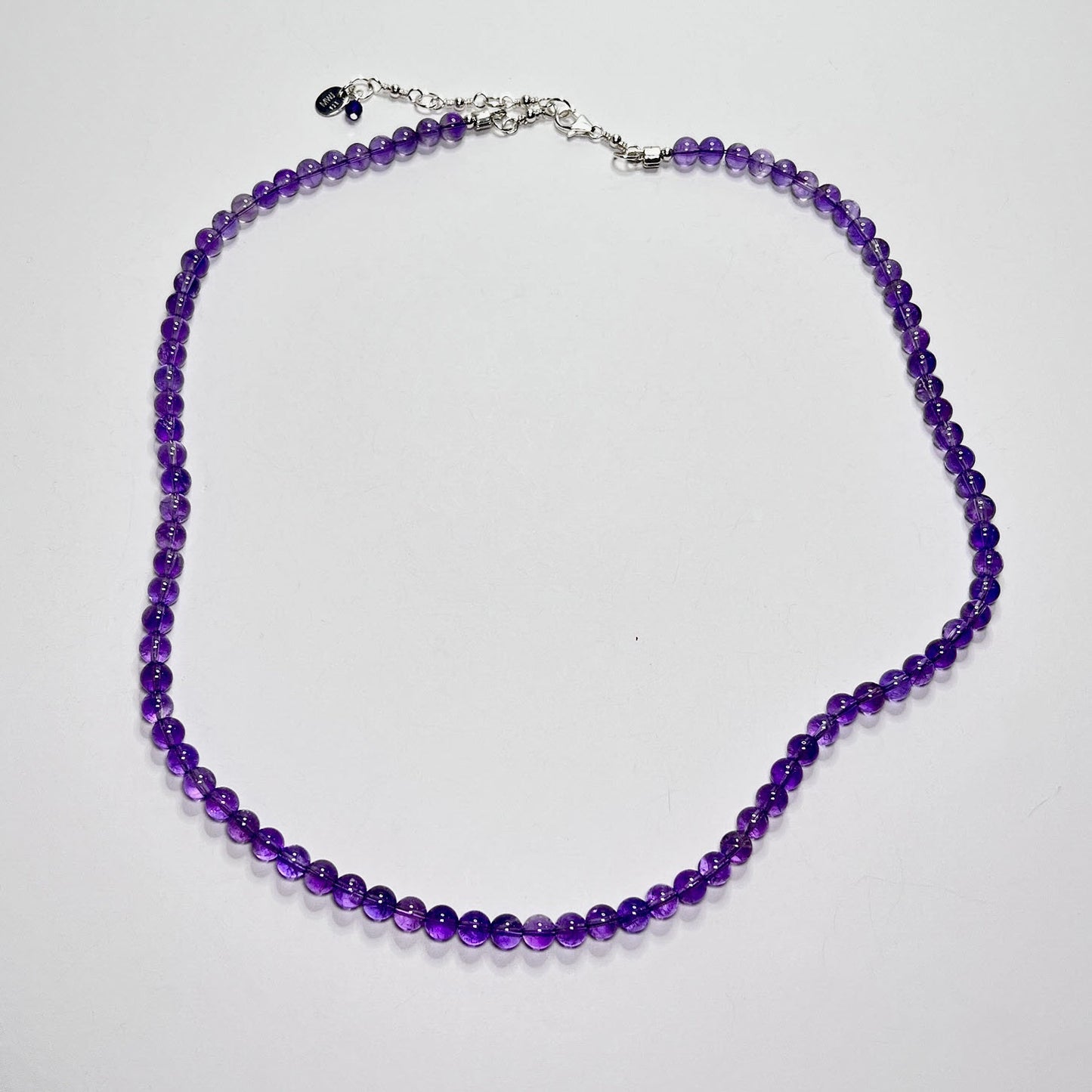 Medium purple amethyst beaded necklace with sterling silver clasp and extender