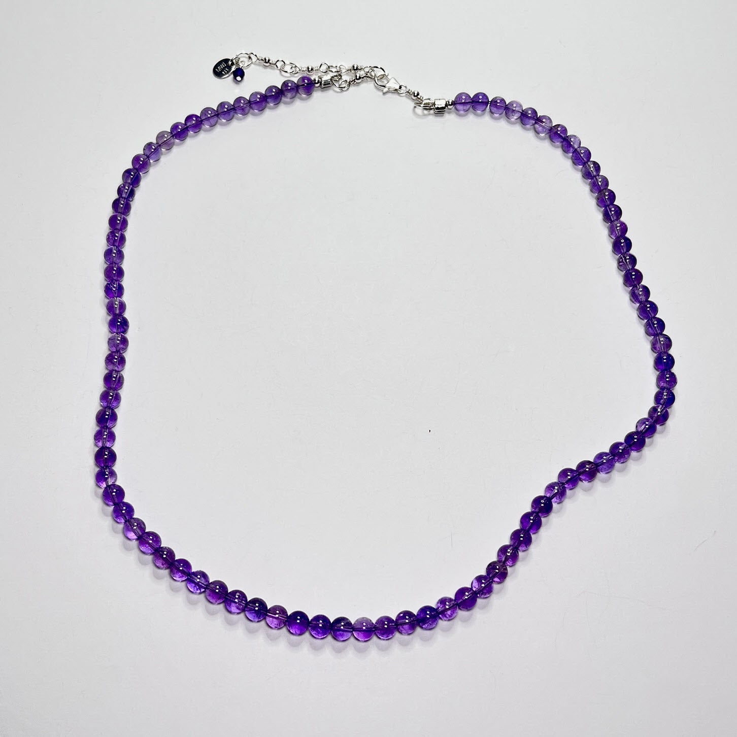 Medium purple amethyst beaded necklace with sterling silver clasp and extender