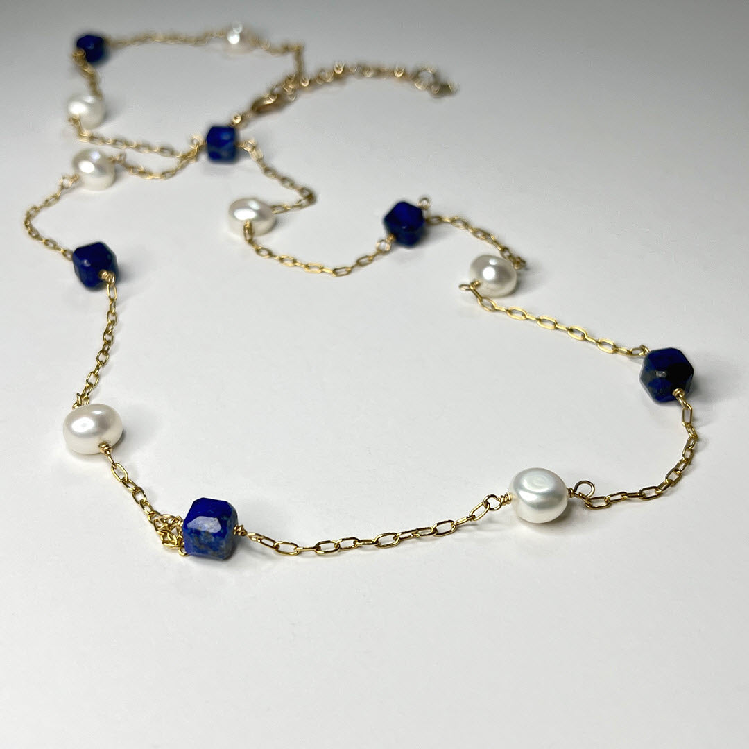 Station necklace with pearls and blue lapis gemstone cubes in 14K gold-filled chain