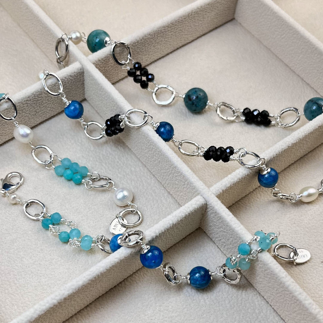 Four Matisse Blues sterling bracelets with gemstones and pearls